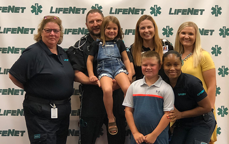 LifeNet Lifesaver Award - Weston Phelps & Kristen Janes with LifeNet EMS Crews